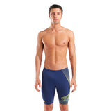 Man wearing a blue swim jammers with Arena logo on a white background