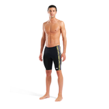 Man wearing black swim jammers with yellow and white stripes on a white background